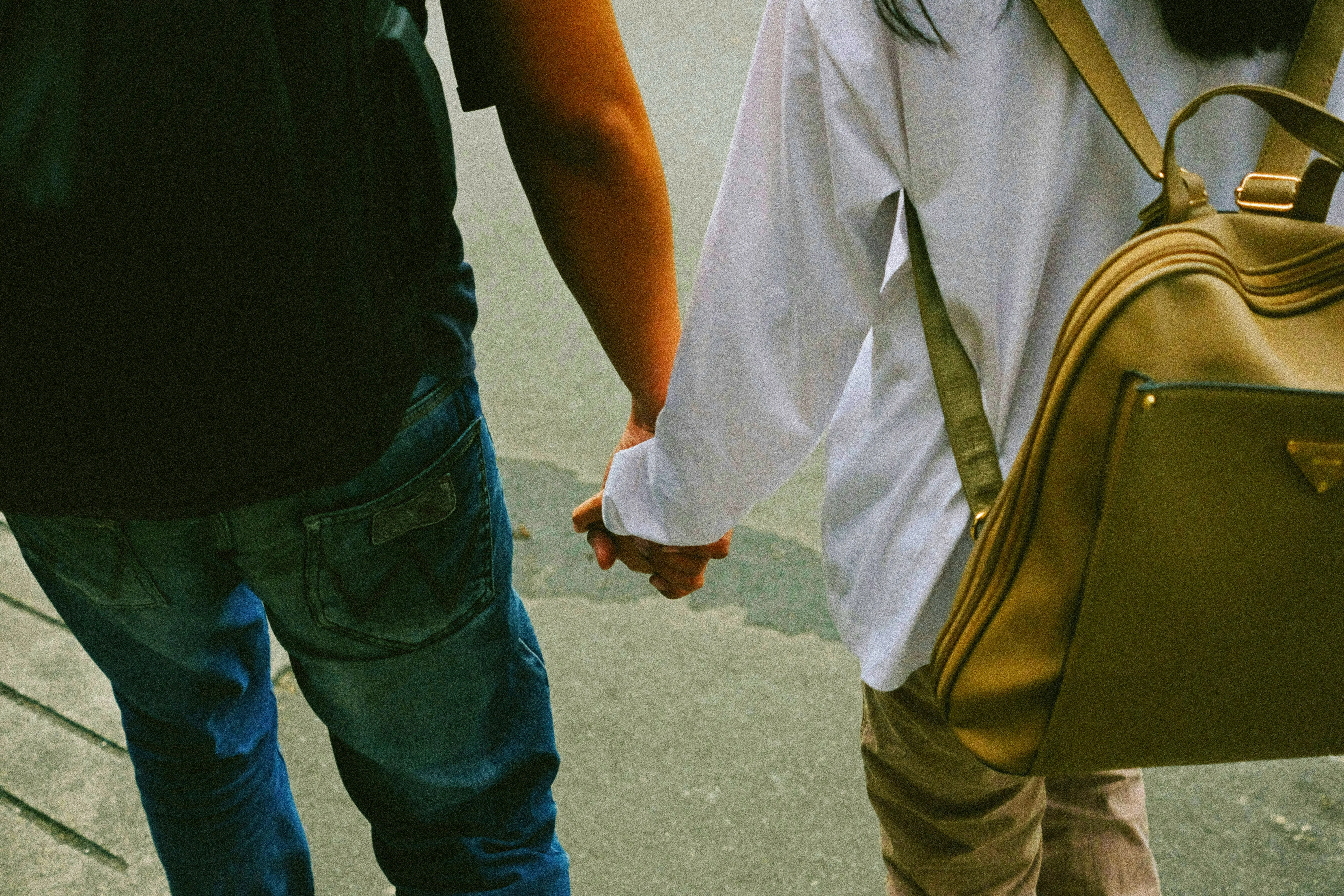 04 dad holding hand with daughter