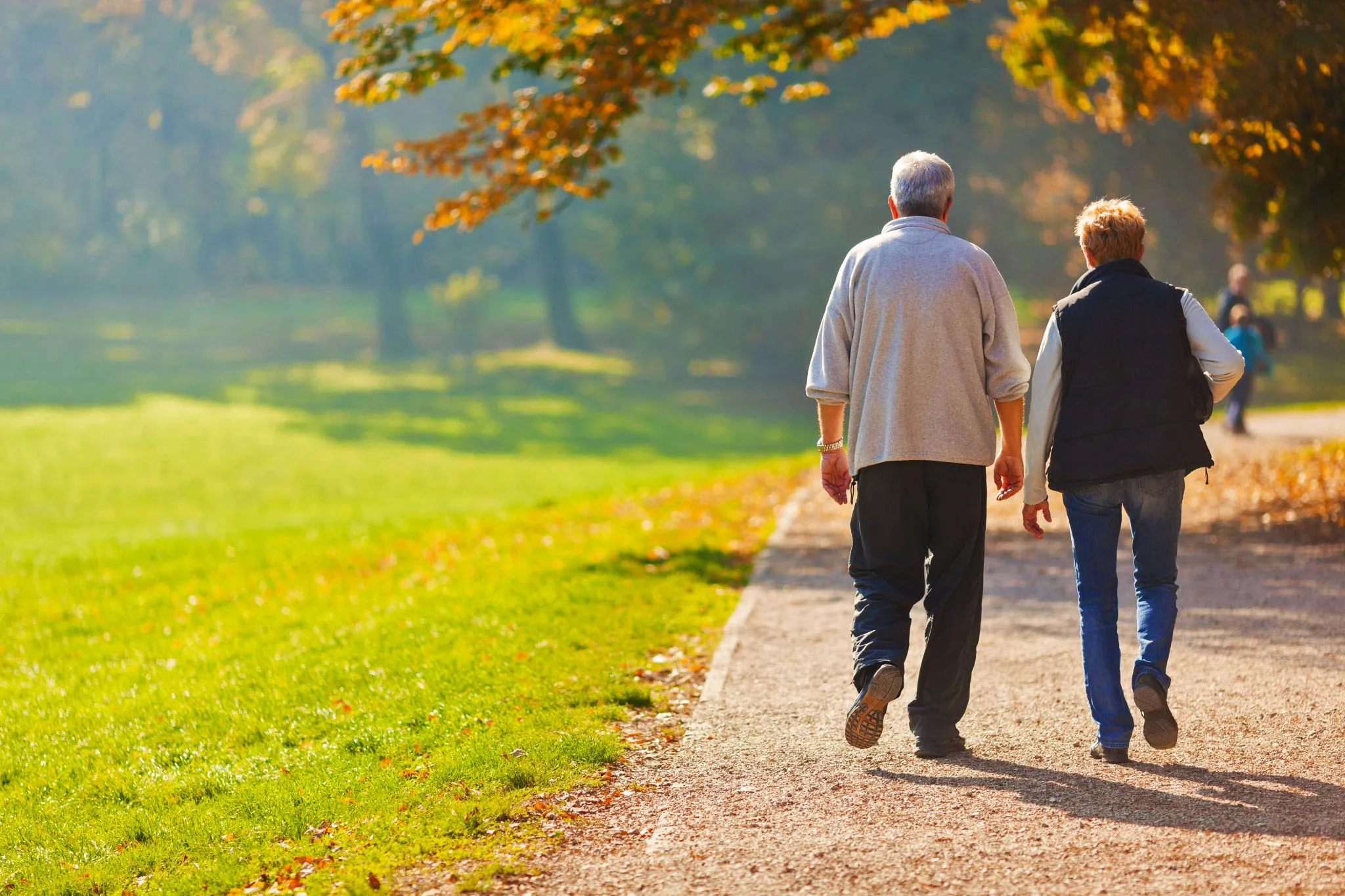 Senior walking in park
