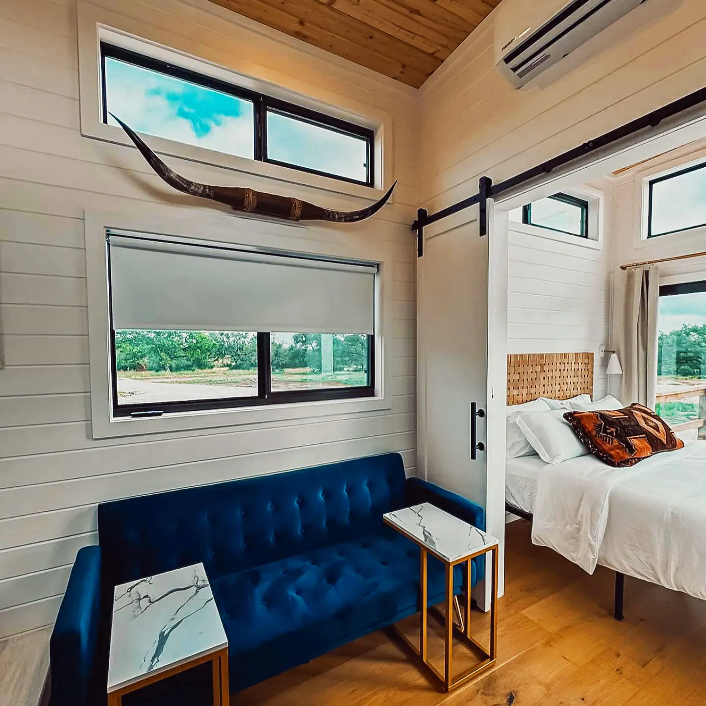 the getaway tiny home is a modern mini escape with downstairs bedroom and cozy loft 3