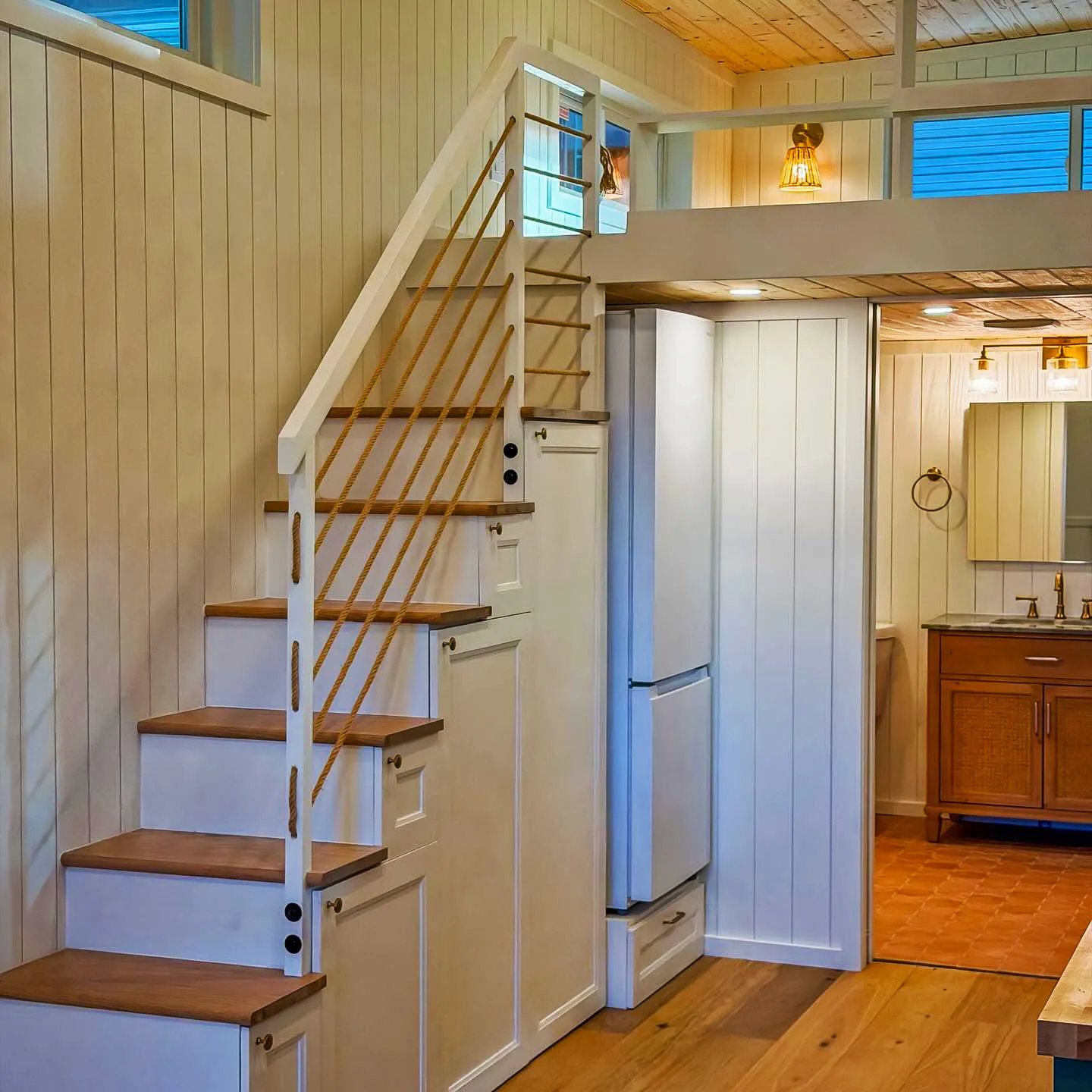 the getaway tiny home is a modern mini escape with downstairs bedroom and cozy loft 5