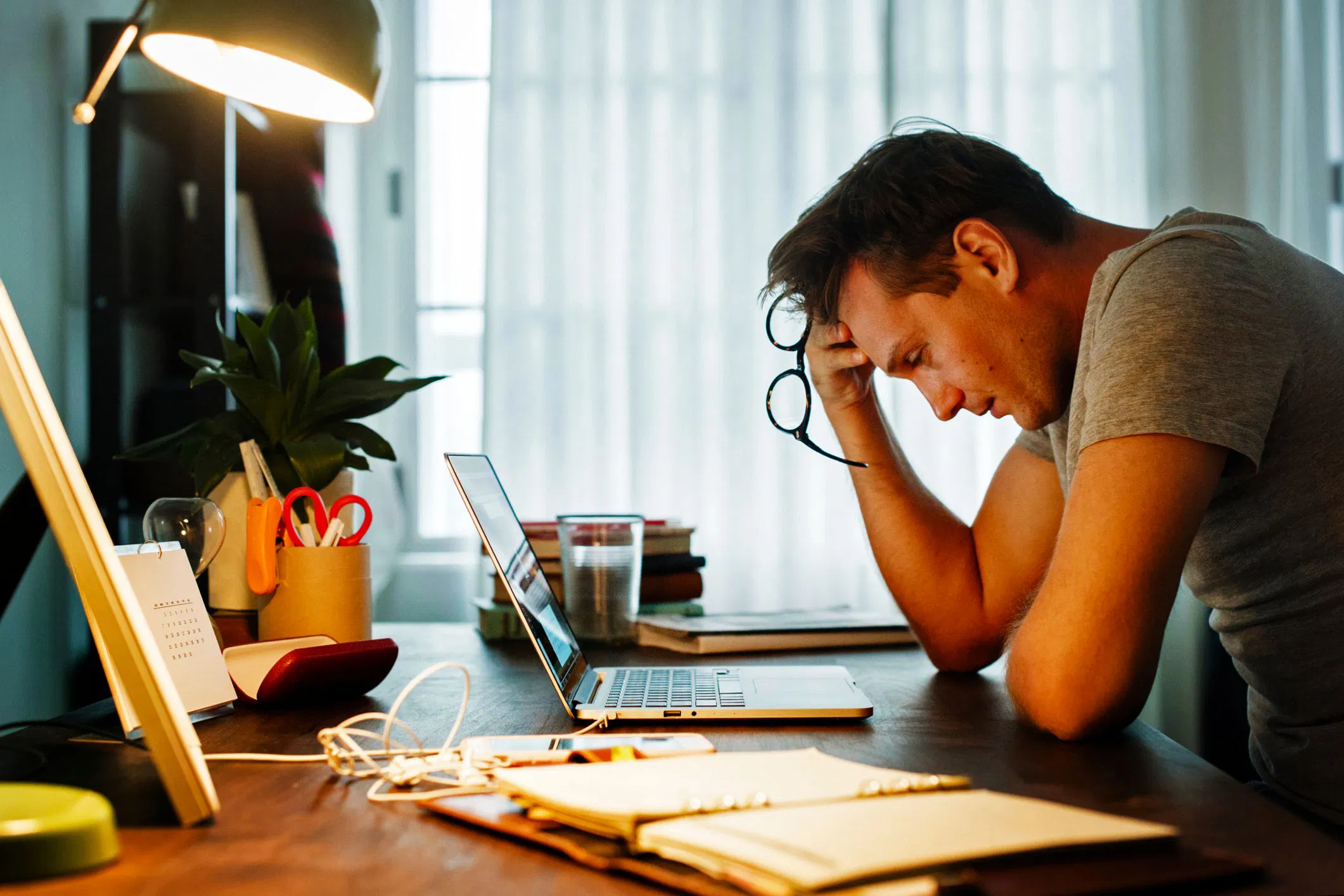 man stressed while working on laptop picture id1022030402