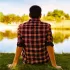 Ilustrasi Orang Yang Duduk Di Tepi Danau